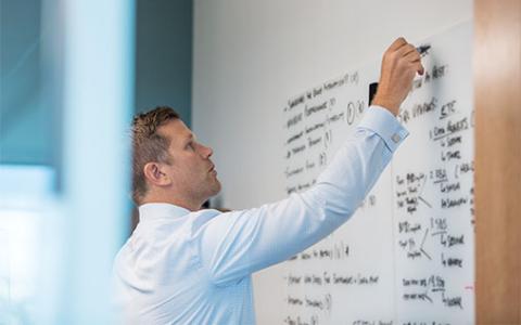 Man using whiteboard